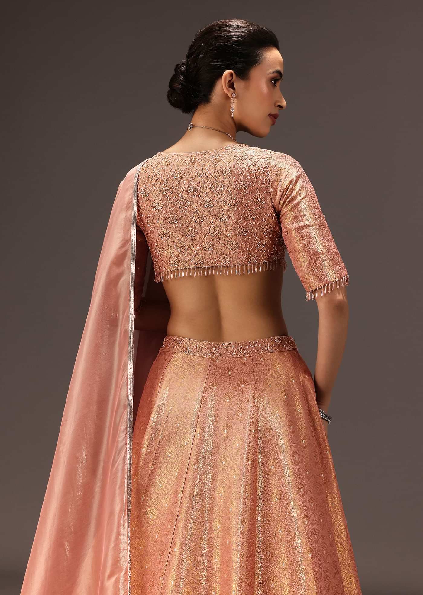 Dusty Peach Banarasi Silk Hand Work Lehenga Set
