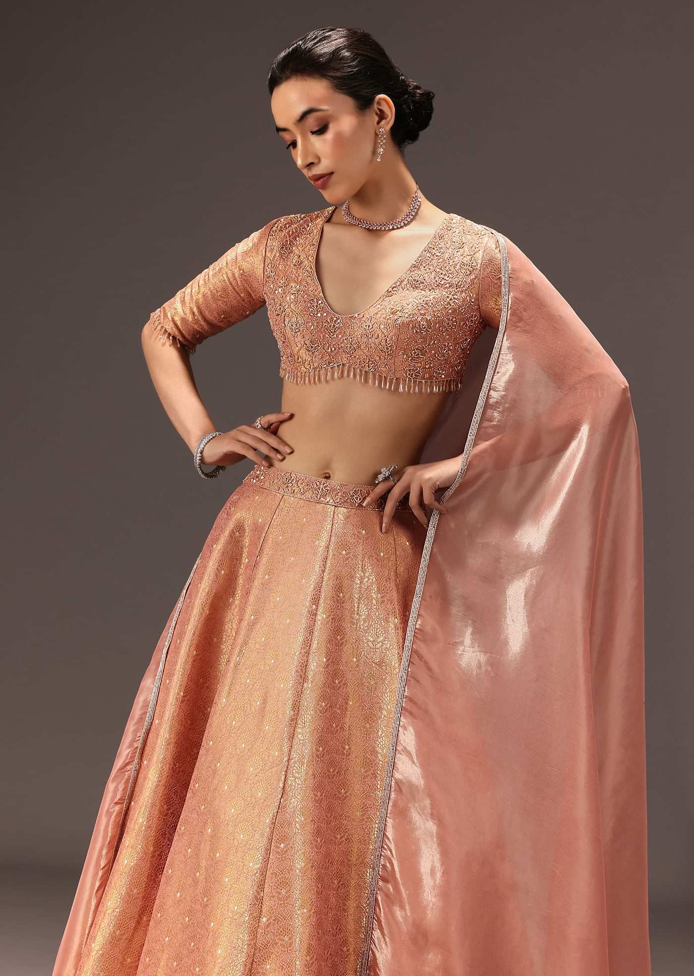 Dusty Peach Banarasi Silk Hand Work Lehenga Set