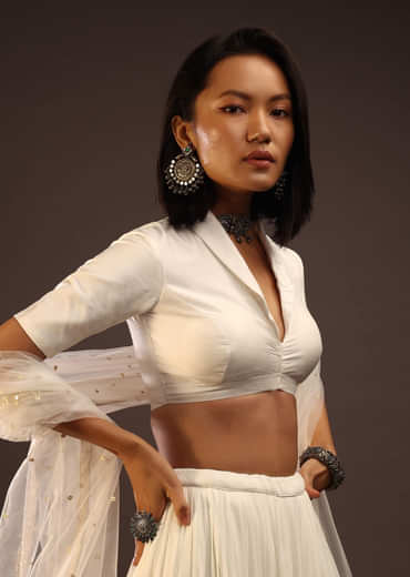 Egret White Half-Sleeved Blouse With Long Collar Neckline. Front Hook Closure With A Straight Hemline.