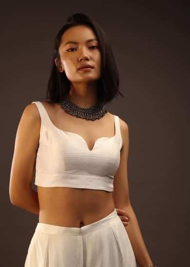 Egret White Sleeveless Blouse With A Sweetheart Neckline. Padded With A Back Hook Closure