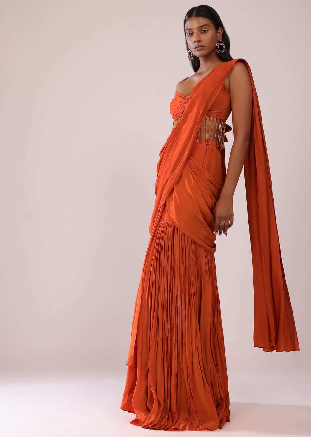 Orange Crepe Drape Saree And Blouse With Crystal Tassels All Over