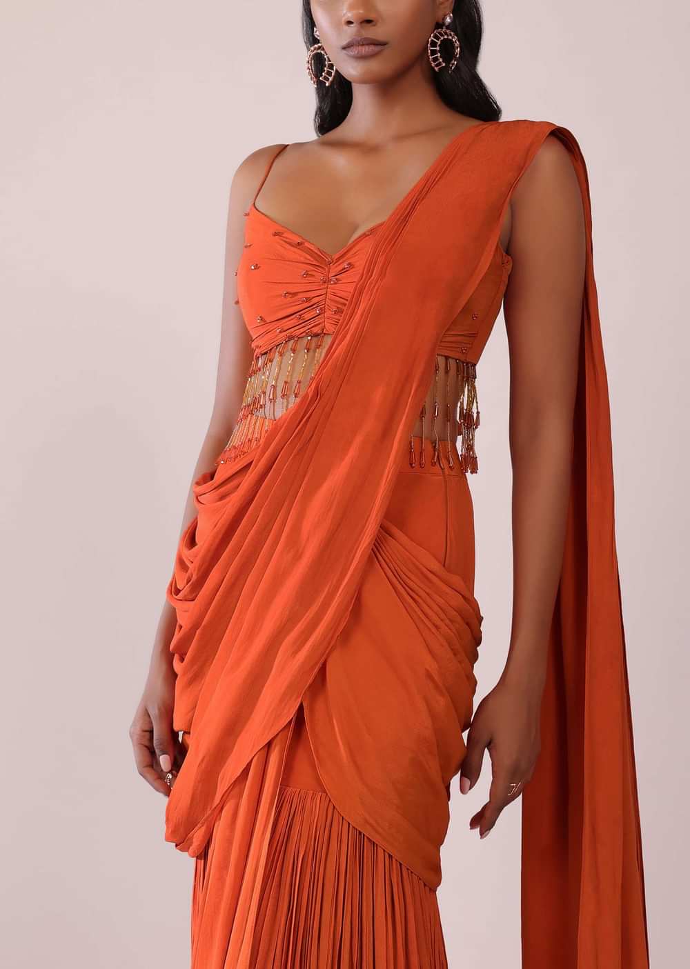 Orange Crepe Drape Saree And Blouse With Crystal Tassels All Over