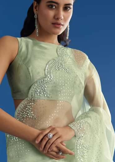 Green Glass Tissue Saree With All Over Cutdana And Sequins Embroidery