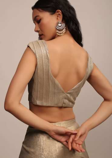 Glittery Gold Cap Sleeve Blouse In Gold Pleated Fabric With A Sweetheart Neckline