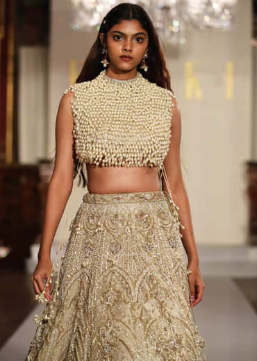 Gold Net Bridal Lehenga With Mother Of Pearl Work
