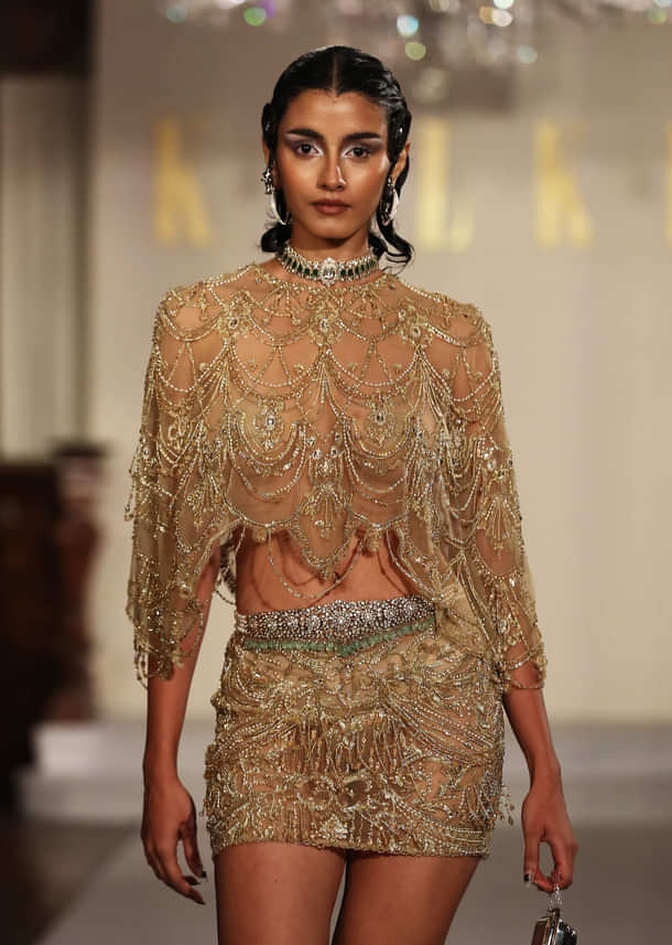 Gold Net Indo Western Jewelled Cape And Skirt Set With Tassels