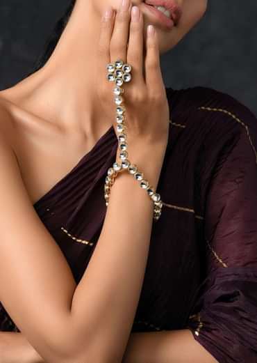 Gold Plated Hand Harness With Beautifully Handcrafted Floral Design Adorned In Kundan Work By Paisley Pop