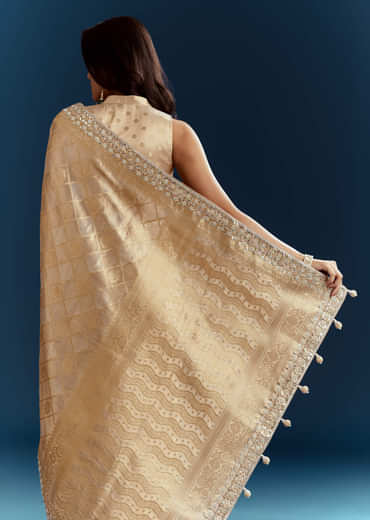 Gold Tissue Brocade Saree With Tassels And Gota Patti Moti Embroidery