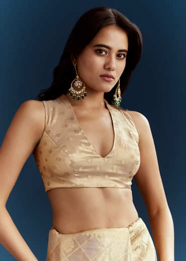 Gold Tissue Brocade Saree With Tassels And Gota Patti Moti Embroidery