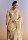 Gold Tissue Silk Saree With Scallop Border And Rich Embroidered Unstitched Blouse