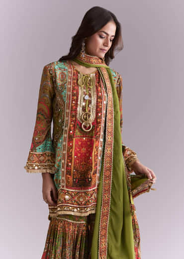 Green Crepe Printed Sharara Suit With Gota Detail And Potli