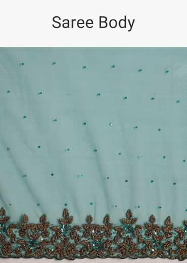 Green Net Saree Featuring Heavy Embroidered Border