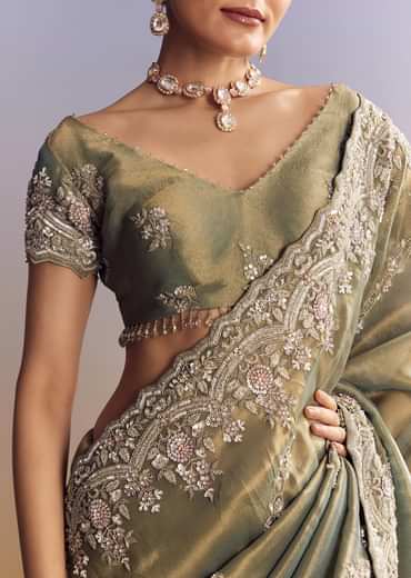 Green Shaded Tissue Saree With Embroidered Borders