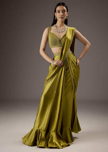 Green Silk Saree With Elegant Bead Work And Frills