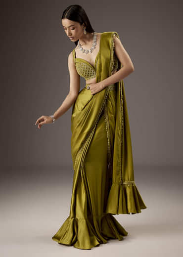 Green Silk Saree With Elegant Bead Work And Frills