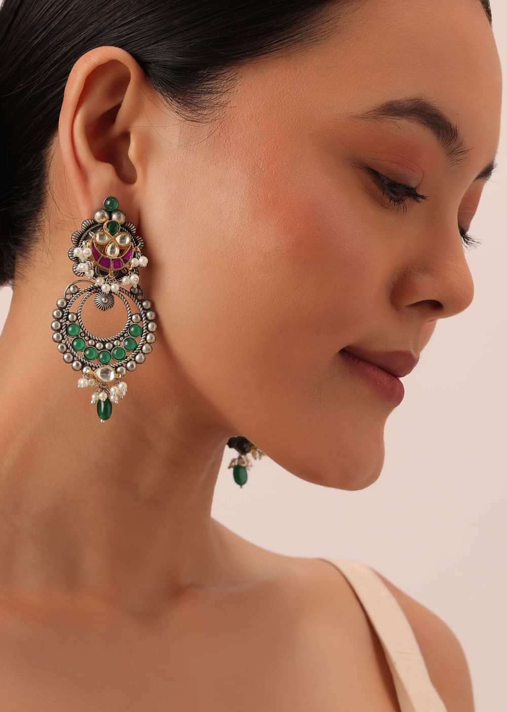 Green Oxidsed Earrings With Meenakari Detail And Floral Top