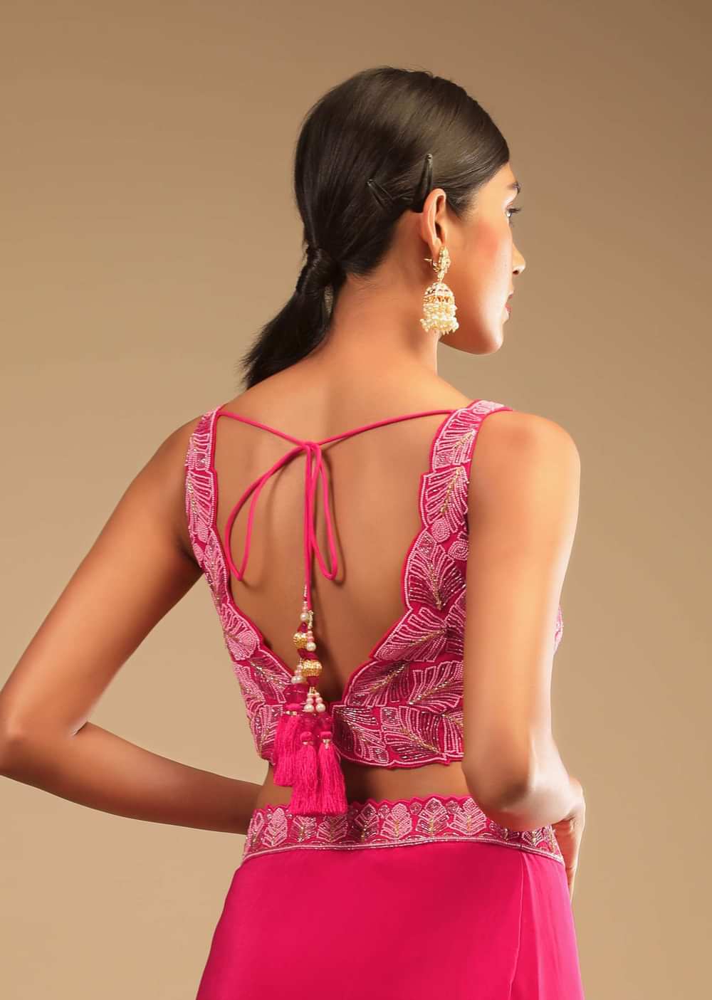 Hot Pink Readymade Saree In Crepe With Ruffle Frill On The Pallu And Beads Embroidered Crop Top And Belt