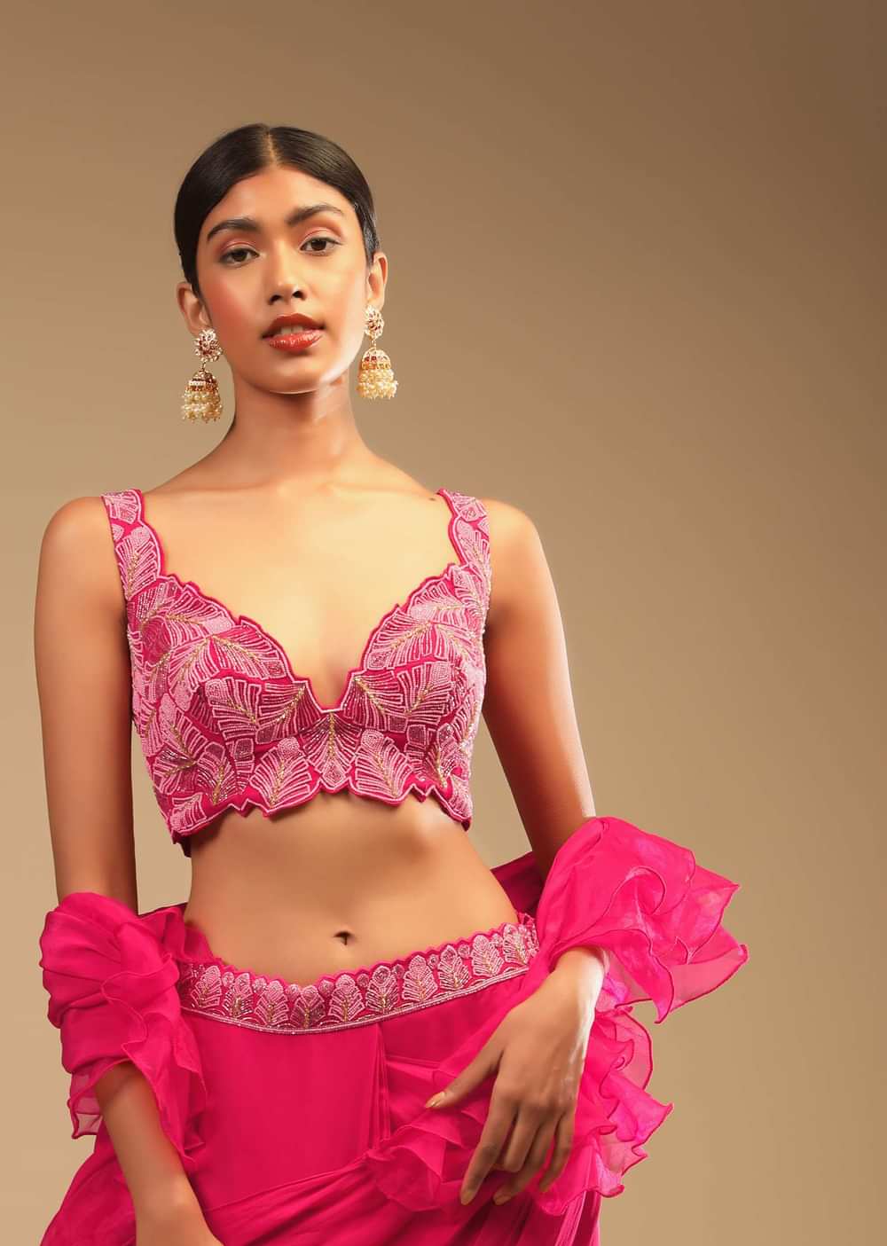 Hot Pink Readymade Saree In Crepe With Ruffle Frill On The Pallu And Beads Embroidered Crop Top And Belt