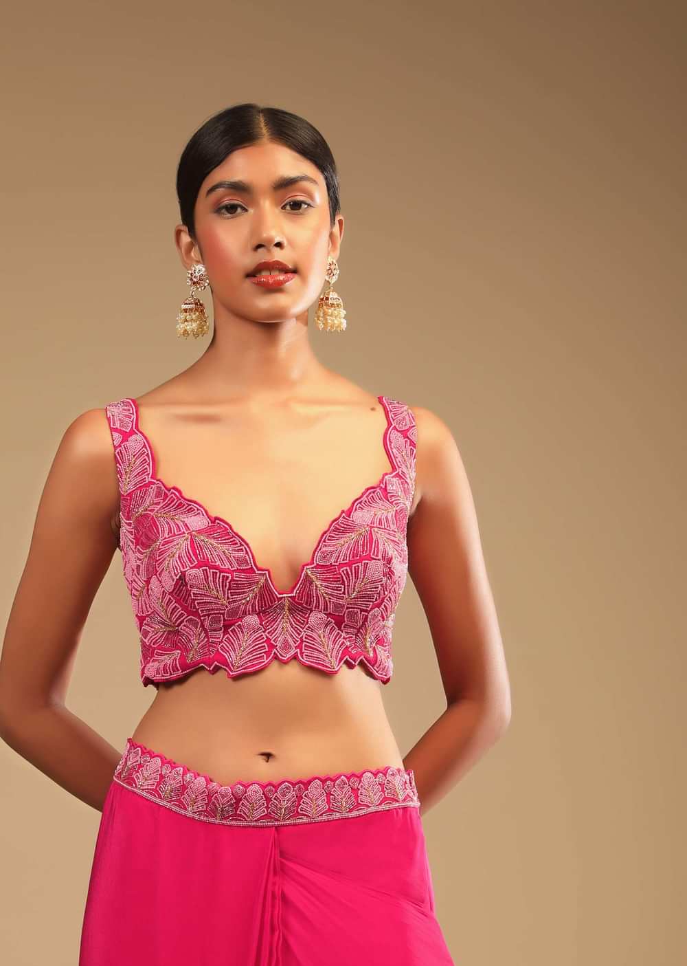 Hot Pink Readymade Saree In Crepe With Ruffle Frill On The Pallu And Beads Embroidered Crop Top And Belt