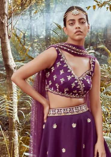 Irish Purple Lehenga Choli In Raw Silk With Cut Dana And Beads Embroidered Floral Buttis And Overlapping V Neckline