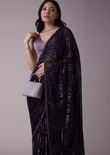 Wine Purple Sequins Saree With An Embellished Border