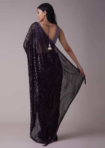 Wine Purple Sequins Saree With An Embellished Border