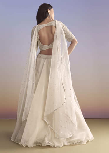 Ivory Organza Bridesmaid Lehenga With Sequins And Cutdana Embroidery