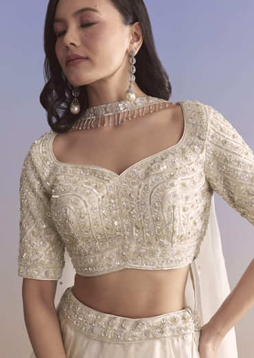 Ivory Organza Bridesmaid Lehenga With Sequins And Cutdana Embroidery