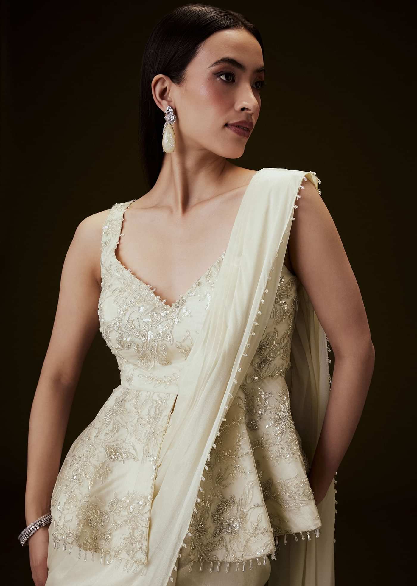 Ivory Embroidered Peplum Top With Saree