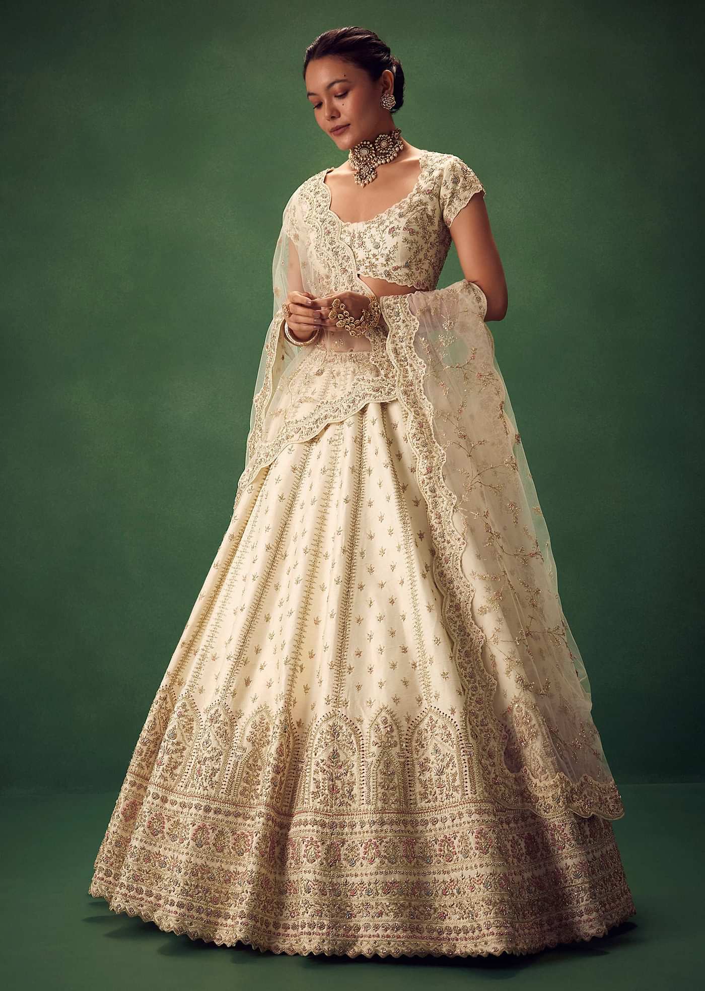 Ivory Lehenga Set With Hand Embroidered Thread And Zari Work