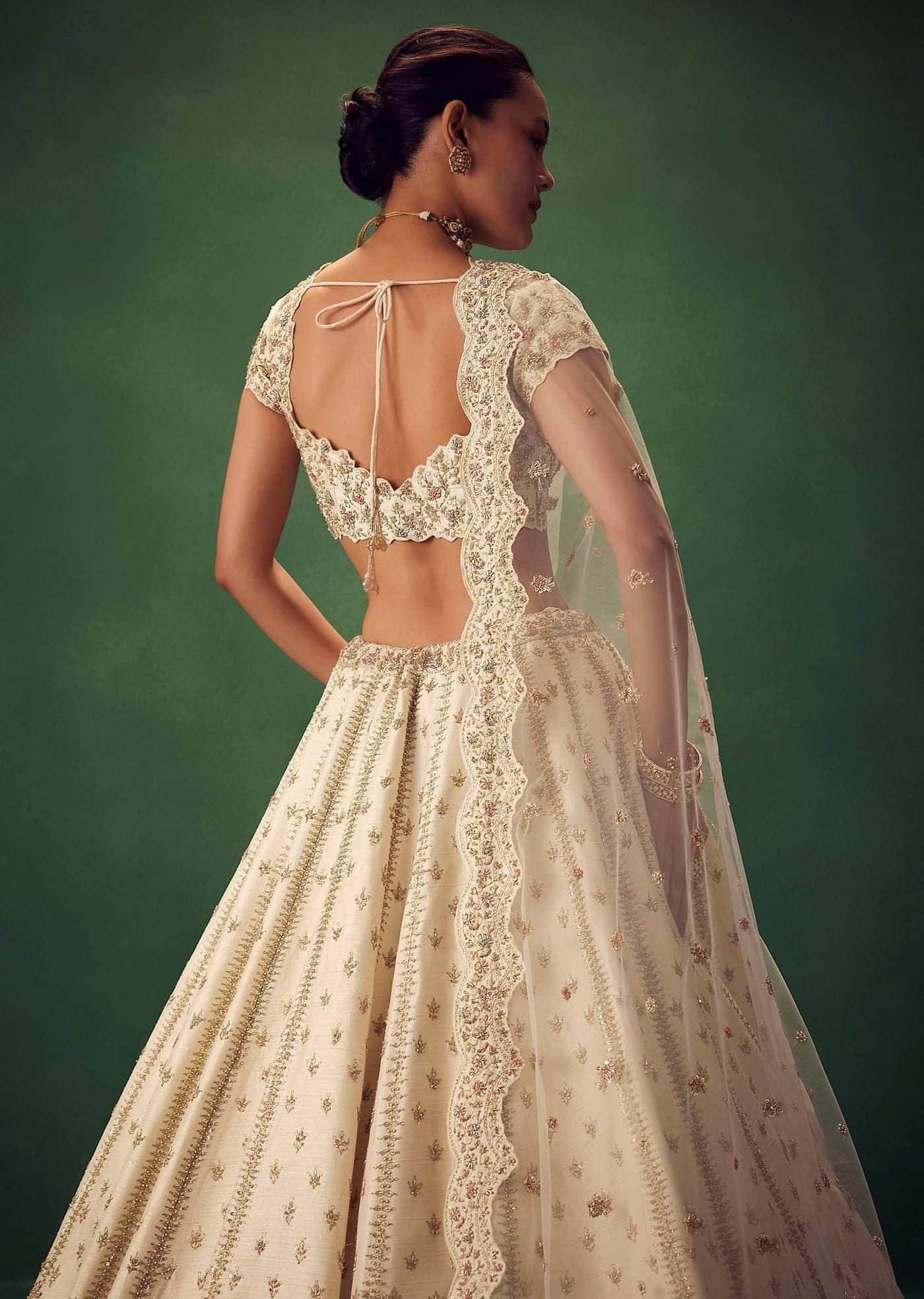 Ivory Lehenga Set With Hand Embroidered Thread And Zari Work