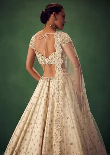 Ivory Lehenga Set With Hand Embroidered Thread And Zari Work