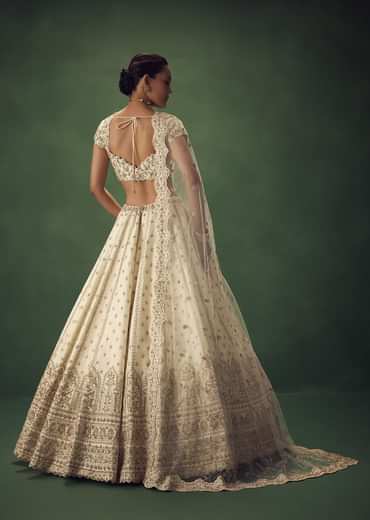 Ivory Lehenga Set With Hand Embroidered Thread And Zari Work