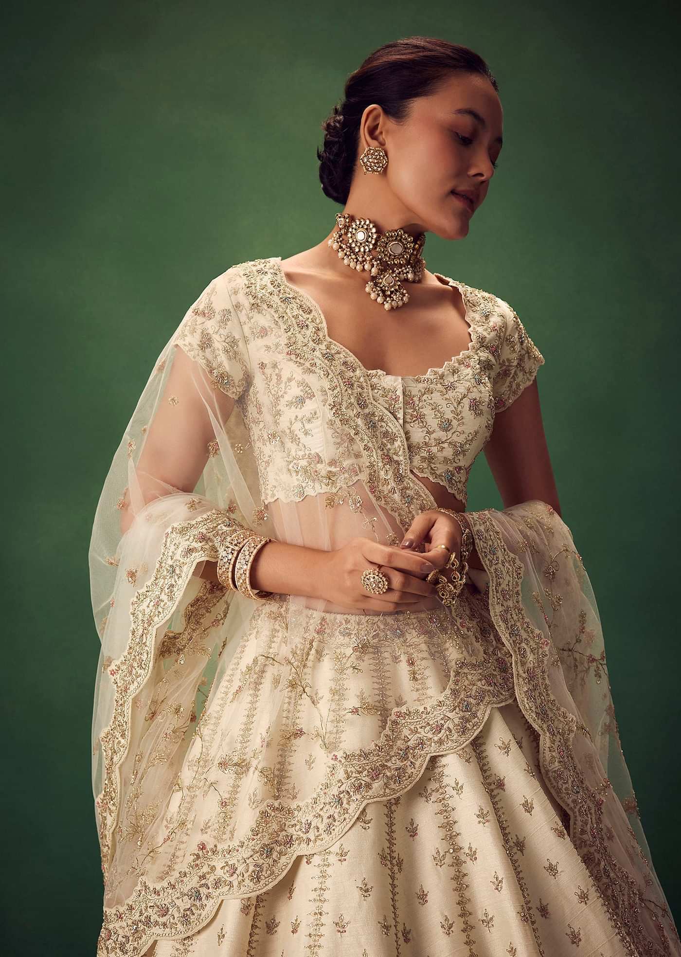 Ivory Lehenga Set With Hand Embroidered Thread And Zari Work