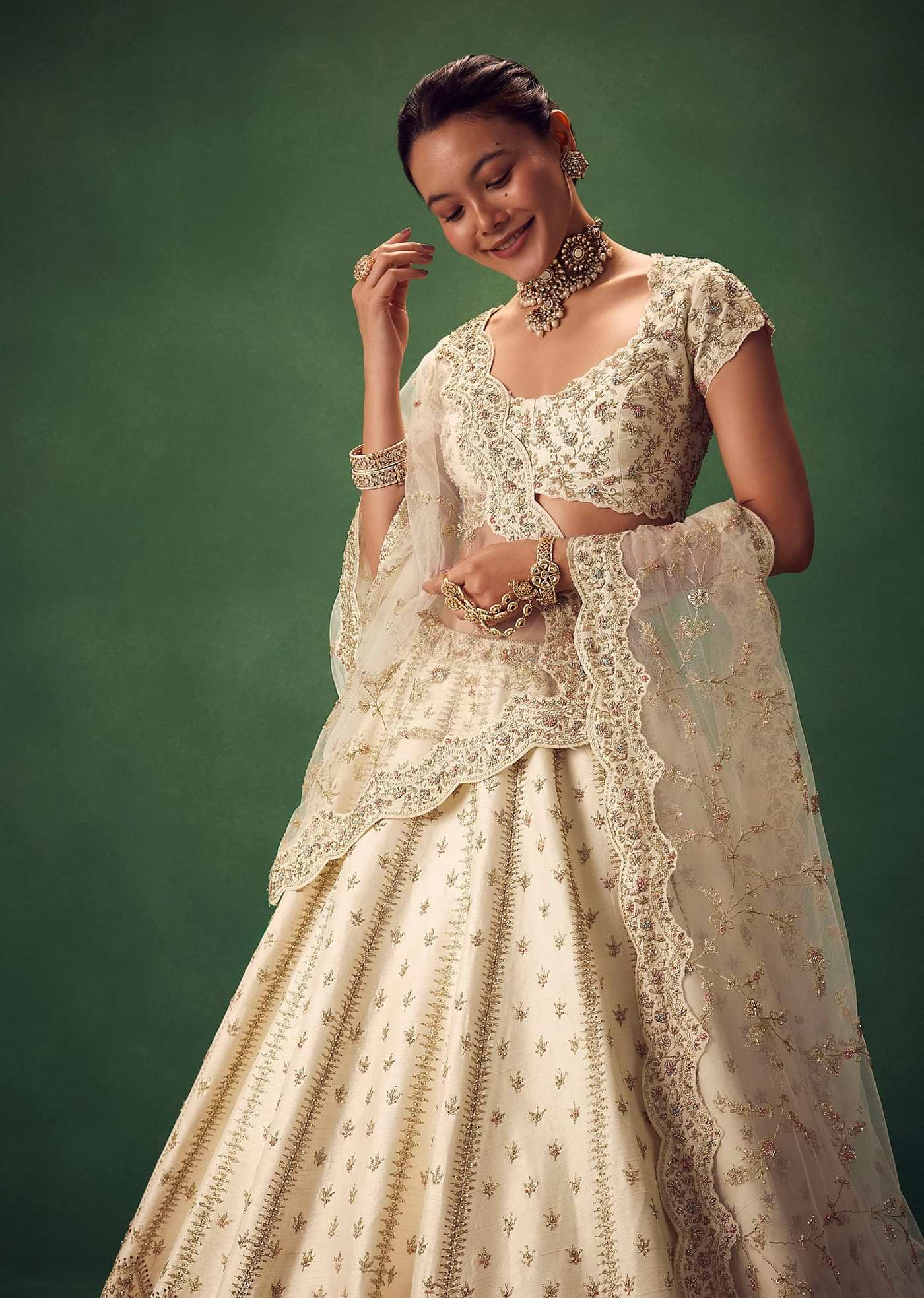 Ivory Lehenga Set With Hand Embroidered Thread And Zari Work