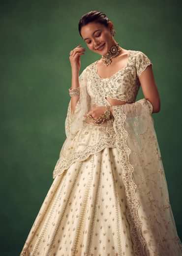 Ivory Lehenga Set With Hand Embroidered Thread And Zari Work