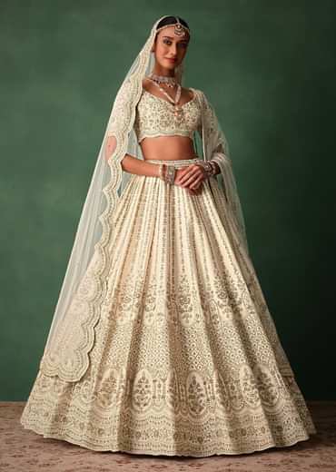 Ivory Raw Silk Hand Embroidered Lehenga Set In Cutdana Work
