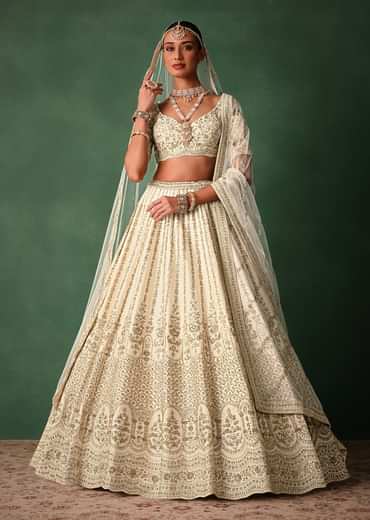 Ivory Raw Silk Hand Embroidered Lehenga Set In Cutdana Work