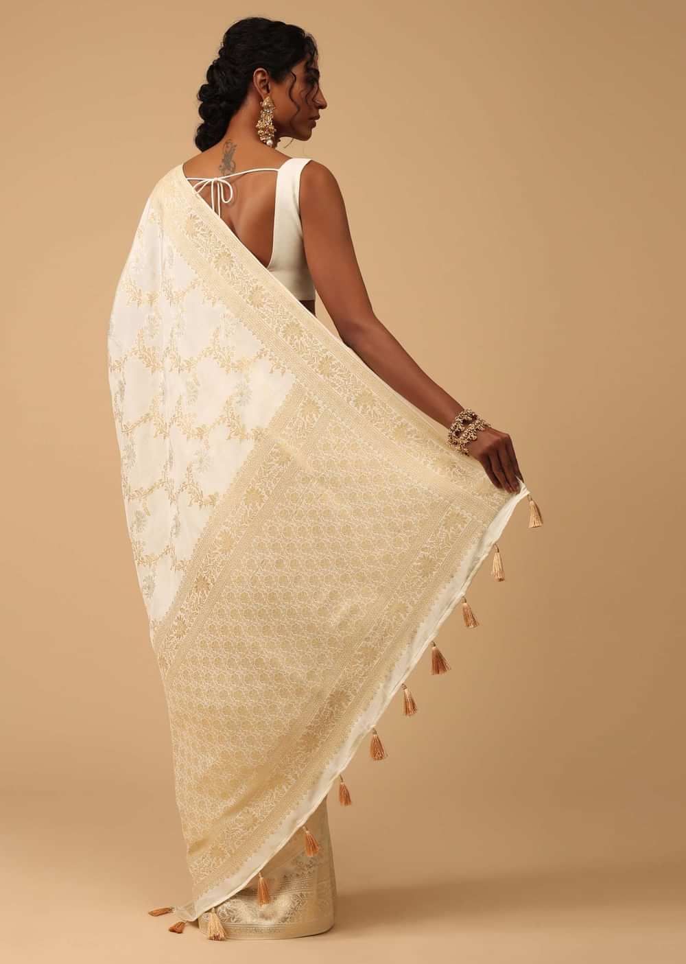 Ivory White Dola Silk Saree With Silver And Gold Jaal Embroidery In Floral Pattern