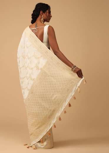 Ivory White Dola Silk Saree With Silver And Gold Jaal Embroidery In Floral Pattern