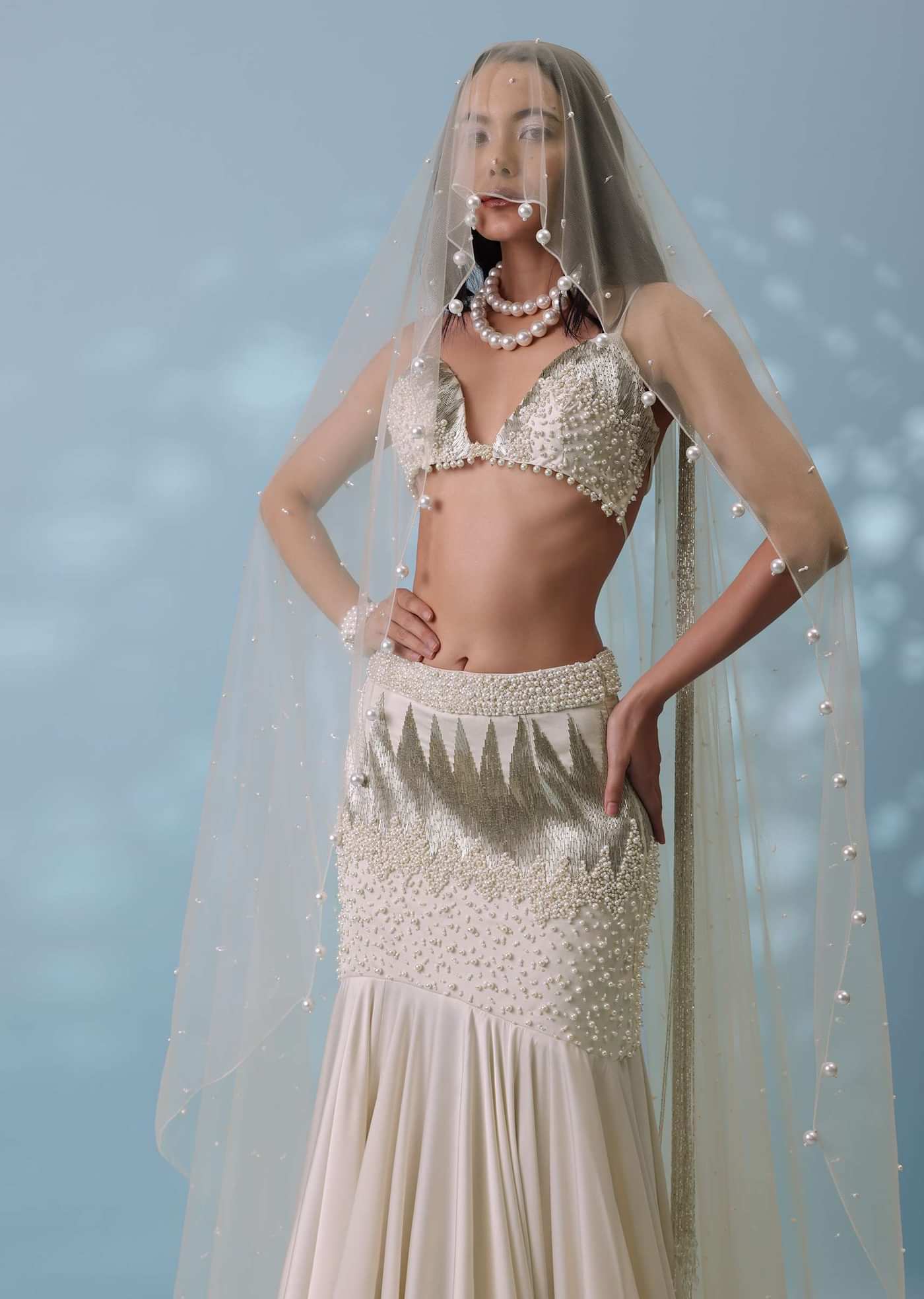 Ivory White Embroidered Trail Lehenga Set In Milano Satin With Tassel Blouse