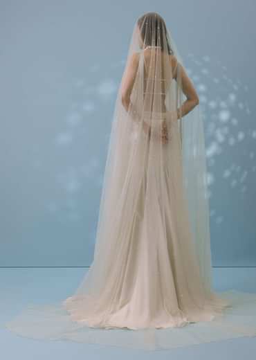 Ivory White Embroidered Trail Lehenga Set In Milano Satin With Tassel Blouse