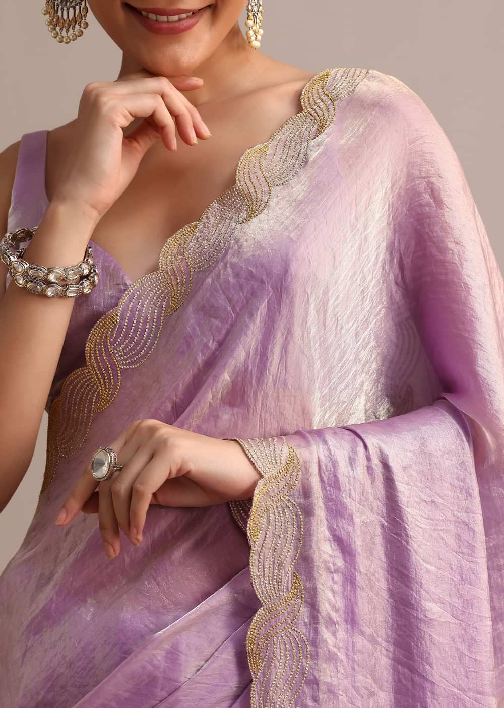 Lavender Tissue Saree With Zari Embroidered Border