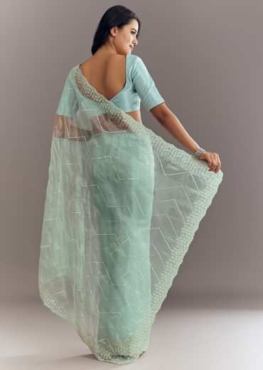 Light Blue Glass Tissue Saree With Stone Embroidery And Scallop Border