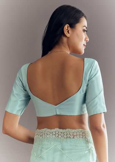 Light Blue Glass Tissue Saree With Stone Embroidery And Scallop Border