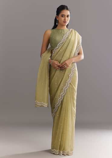 Light Green Glossy Crushed Tissue Saree With Cutdana Sequins Embroidery And Scallop Border