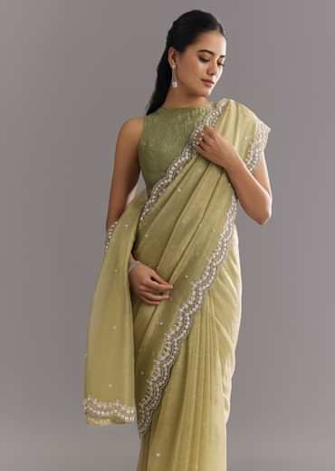 Light Green Glossy Crushed Tissue Saree With Cutdana Sequins Embroidery And Scallop Border