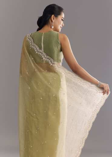 Light Green Glossy Crushed Tissue Saree With Cutdana Sequins Embroidery And Scallop Border