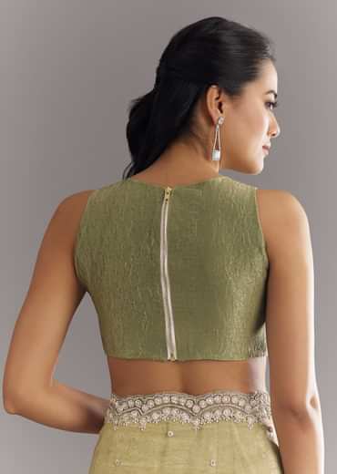 Light Green Glossy Crushed Tissue Saree With Cutdana Sequins Embroidery And Scallop Border