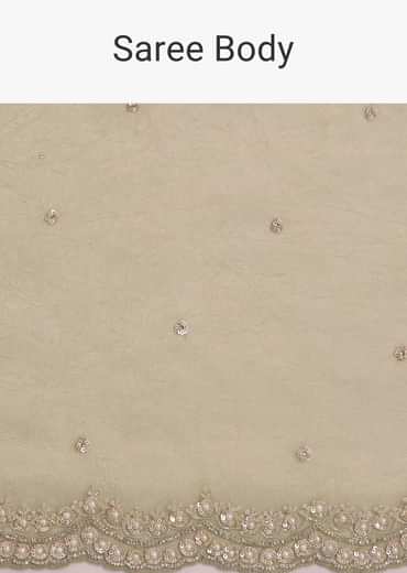 Light Green Glossy Crushed Tissue Saree With Cutdana Sequins Embroidery And Scallop Border